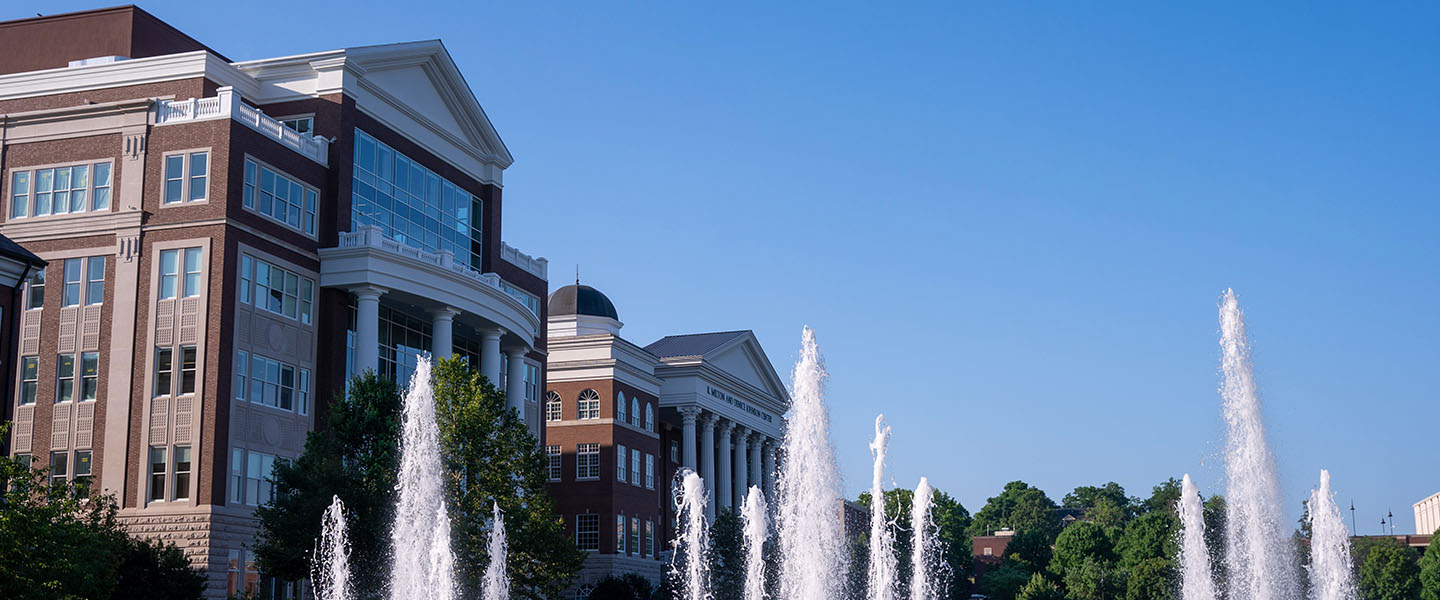 Campus buildings with fountain in front