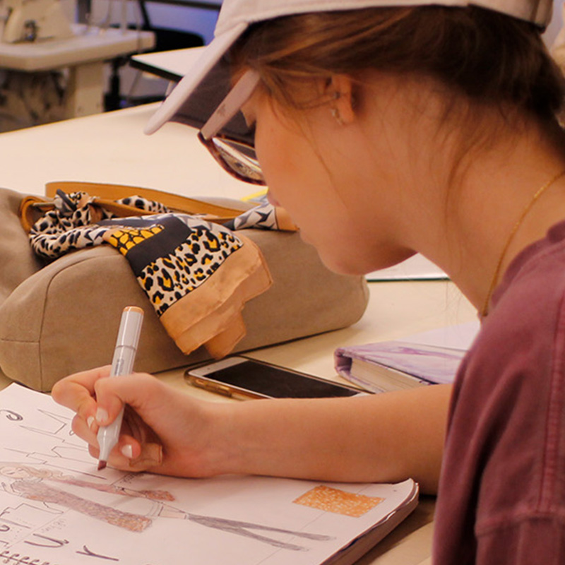 Adult student working on a fashion project