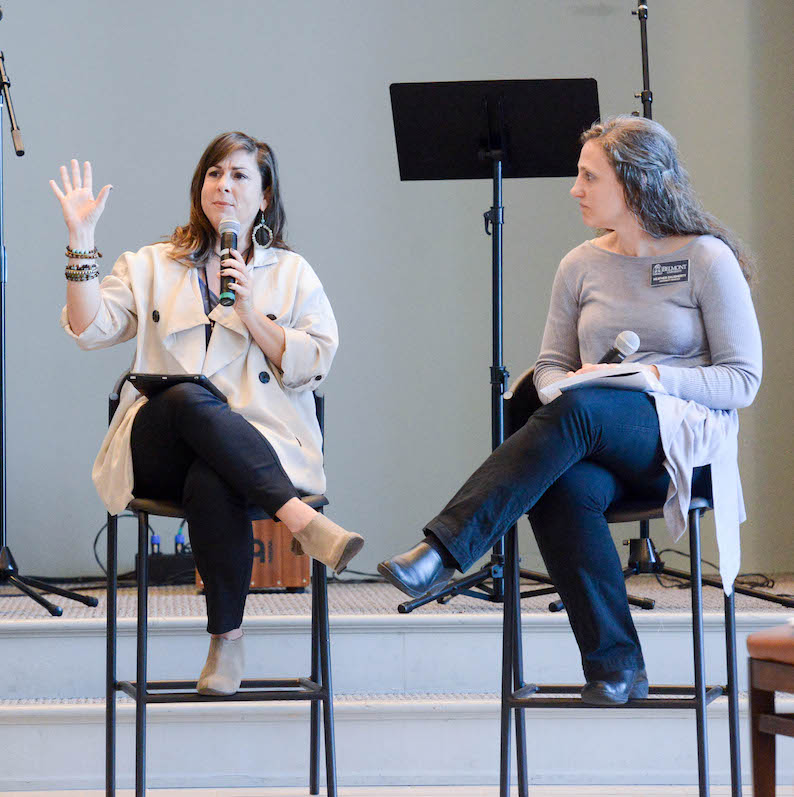 Professors leading talk in chapel