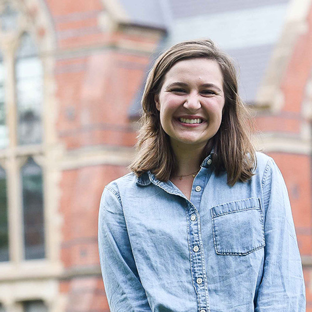 Student poses for picture abroad