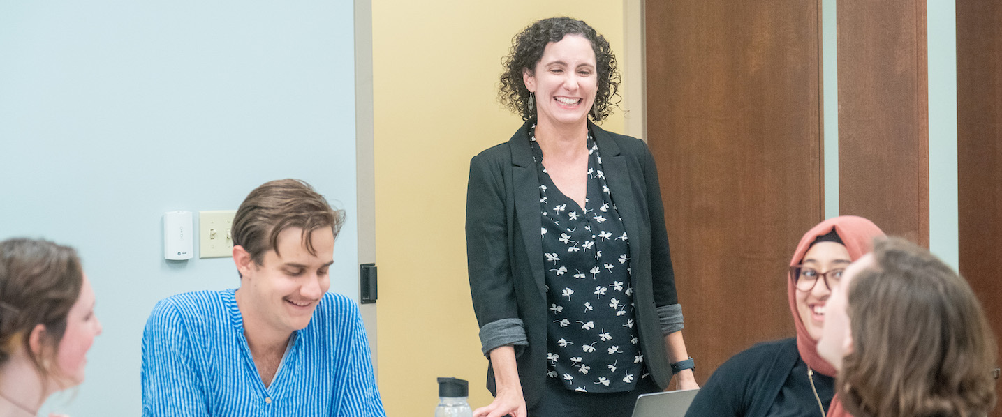 Dr. Susan Finch speaks to a classroom of students