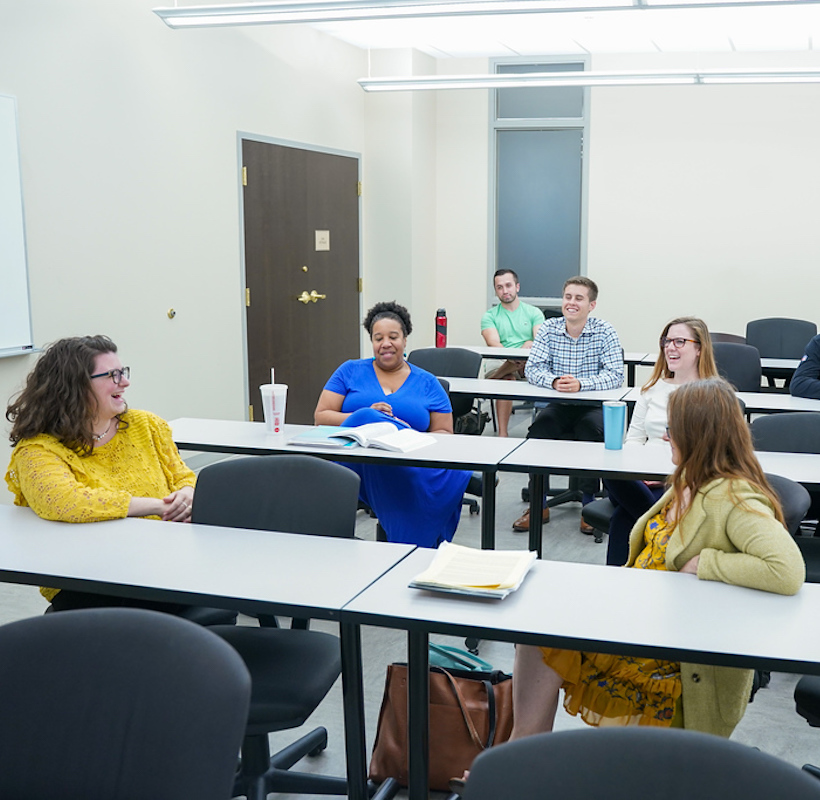 Students have class discussion in class room during class time