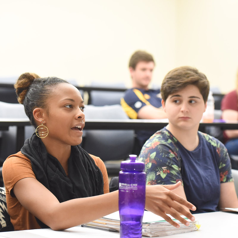 Student participating in class discussion