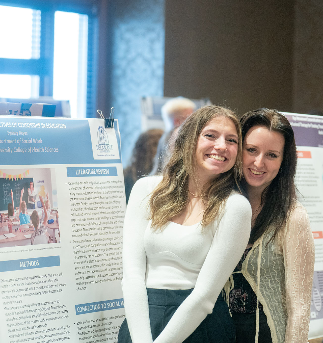 social work students posing with a poster of a project