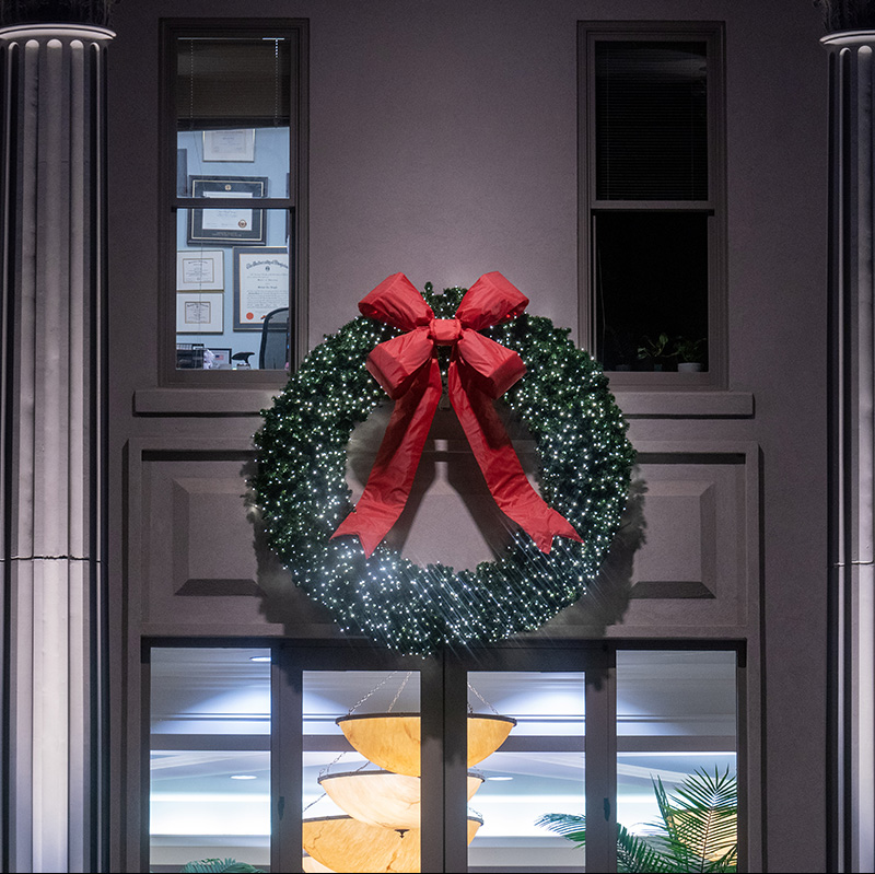 A Christmas wreath on a Belmont building