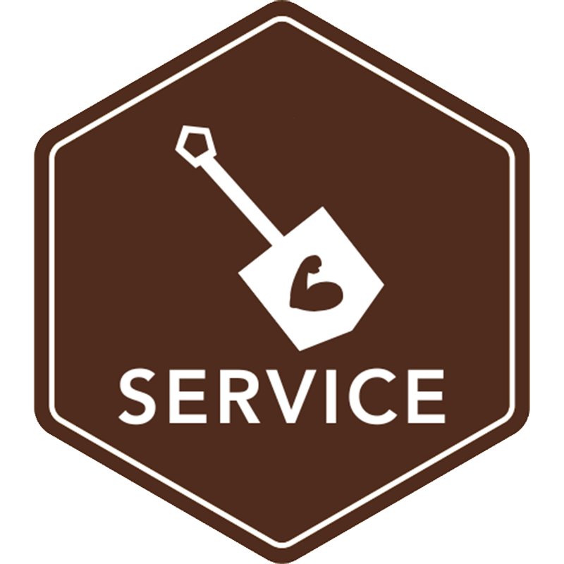 white outline of shovel on brown background