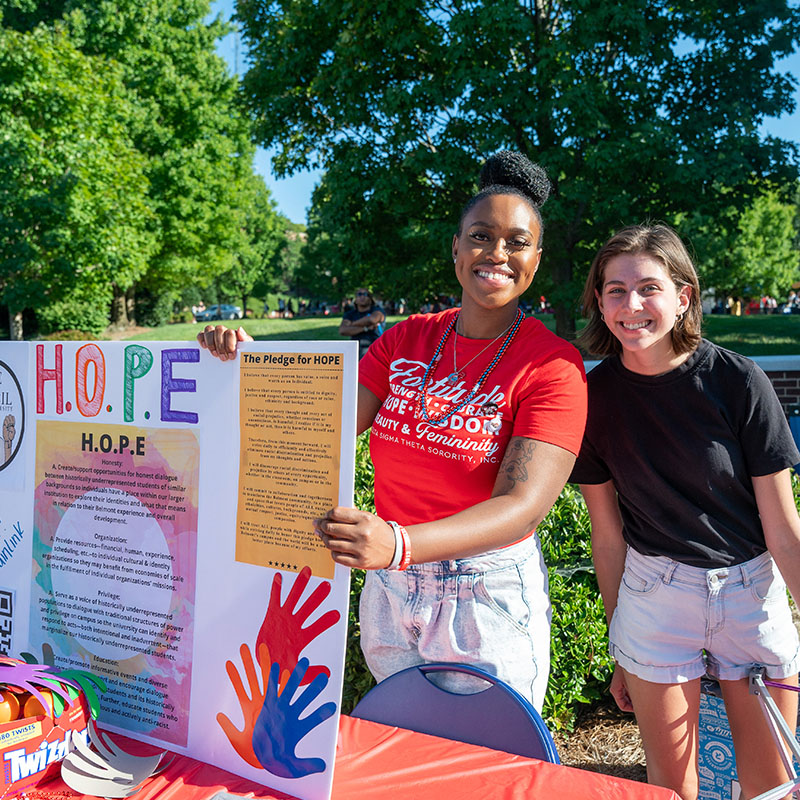 Students promoting their club at the Bruin Link Fair