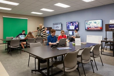 Students working in the Belmont Vision office