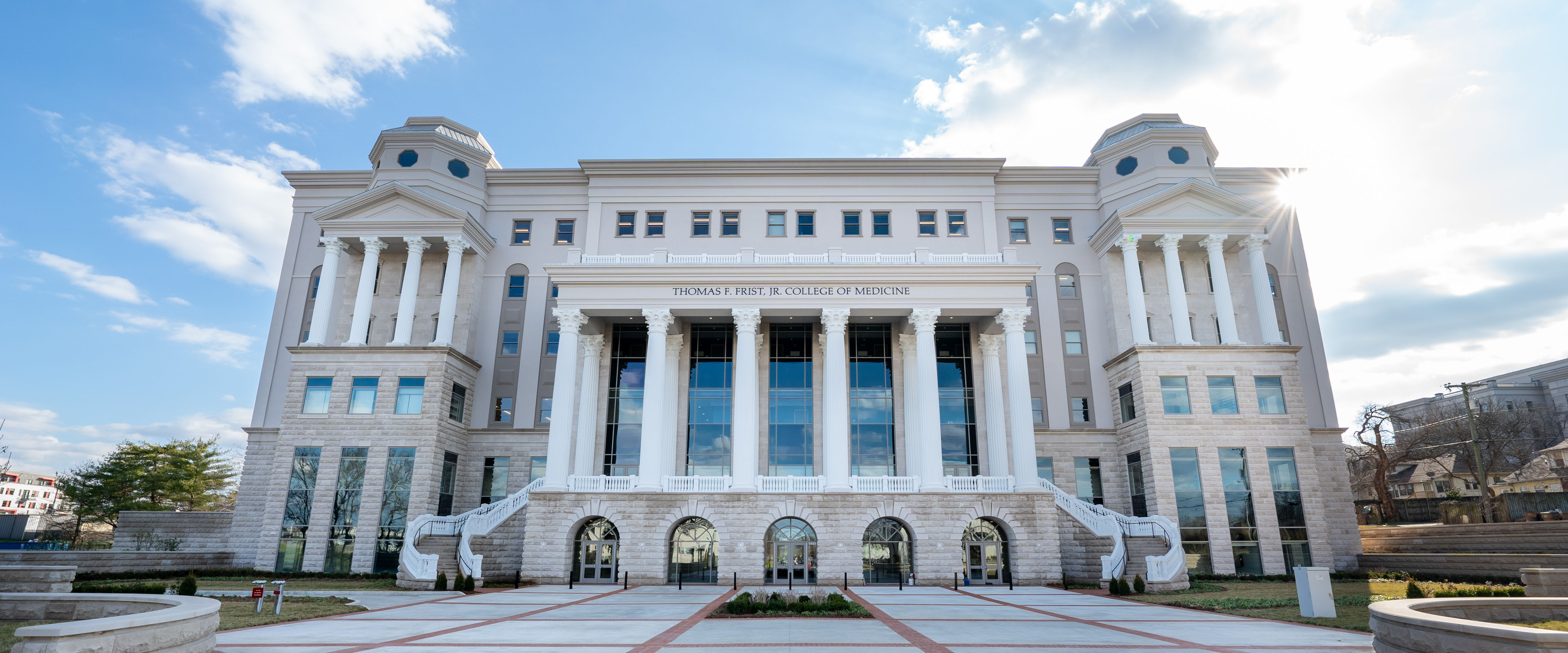 Thomas Frist Jr. College of Medicine building on a sunny day