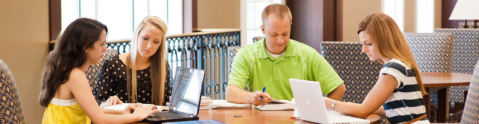 Students studying at table