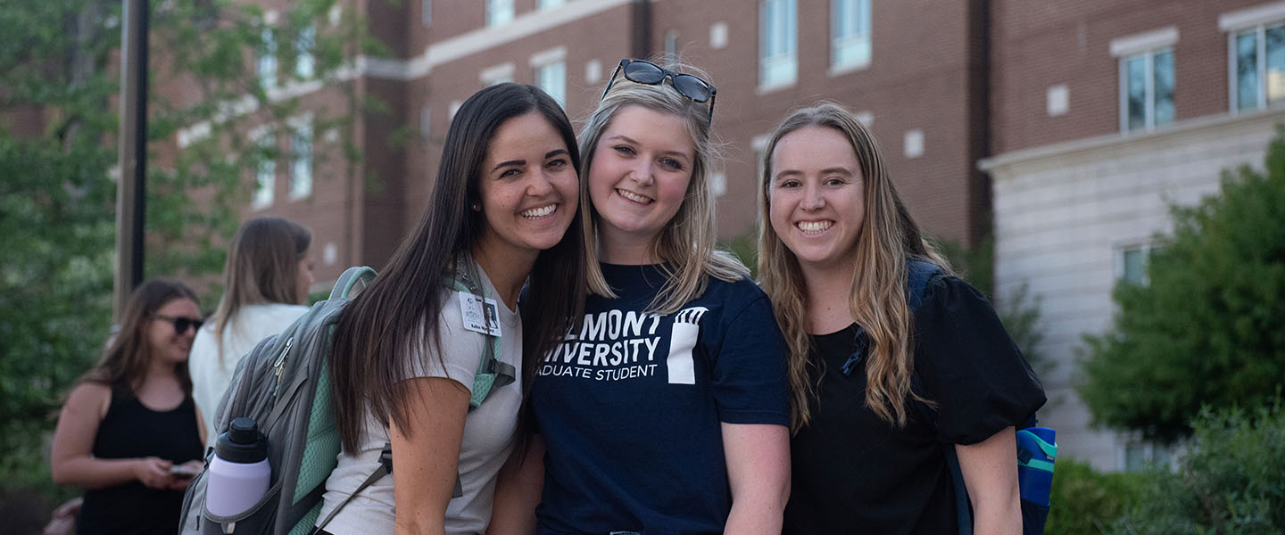 Graduate Students at an event on Belmont's main lawn