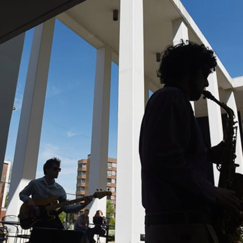 Students playing instruments in the quad