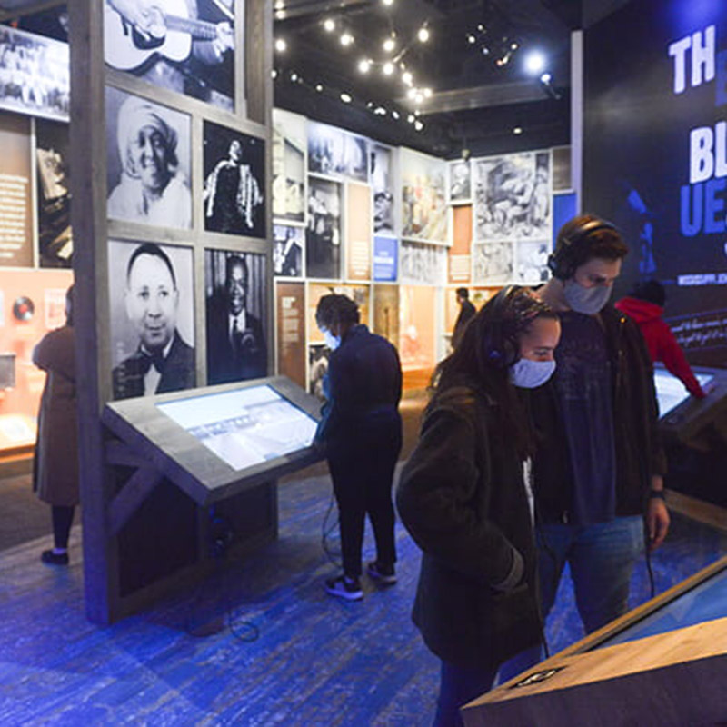 students exploring the exhibits in the National Museum of African American Music