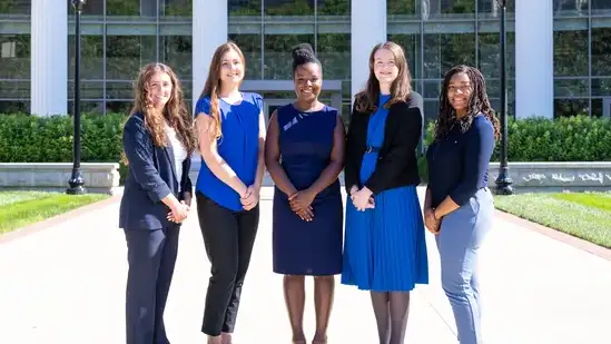 A group of pharmacy fellows posing for a photo