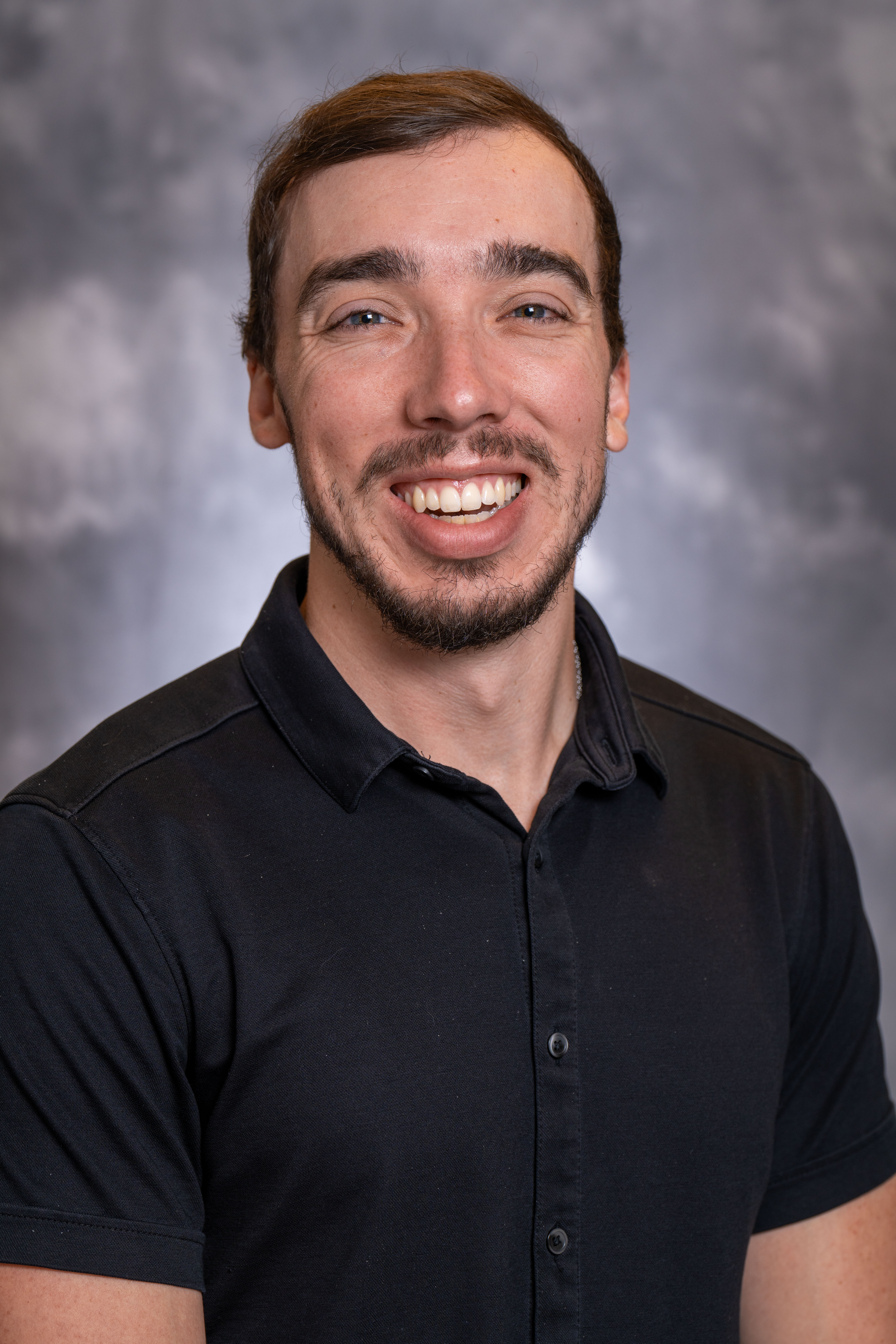 Decorative image placeholder of Belmont logo with blue background