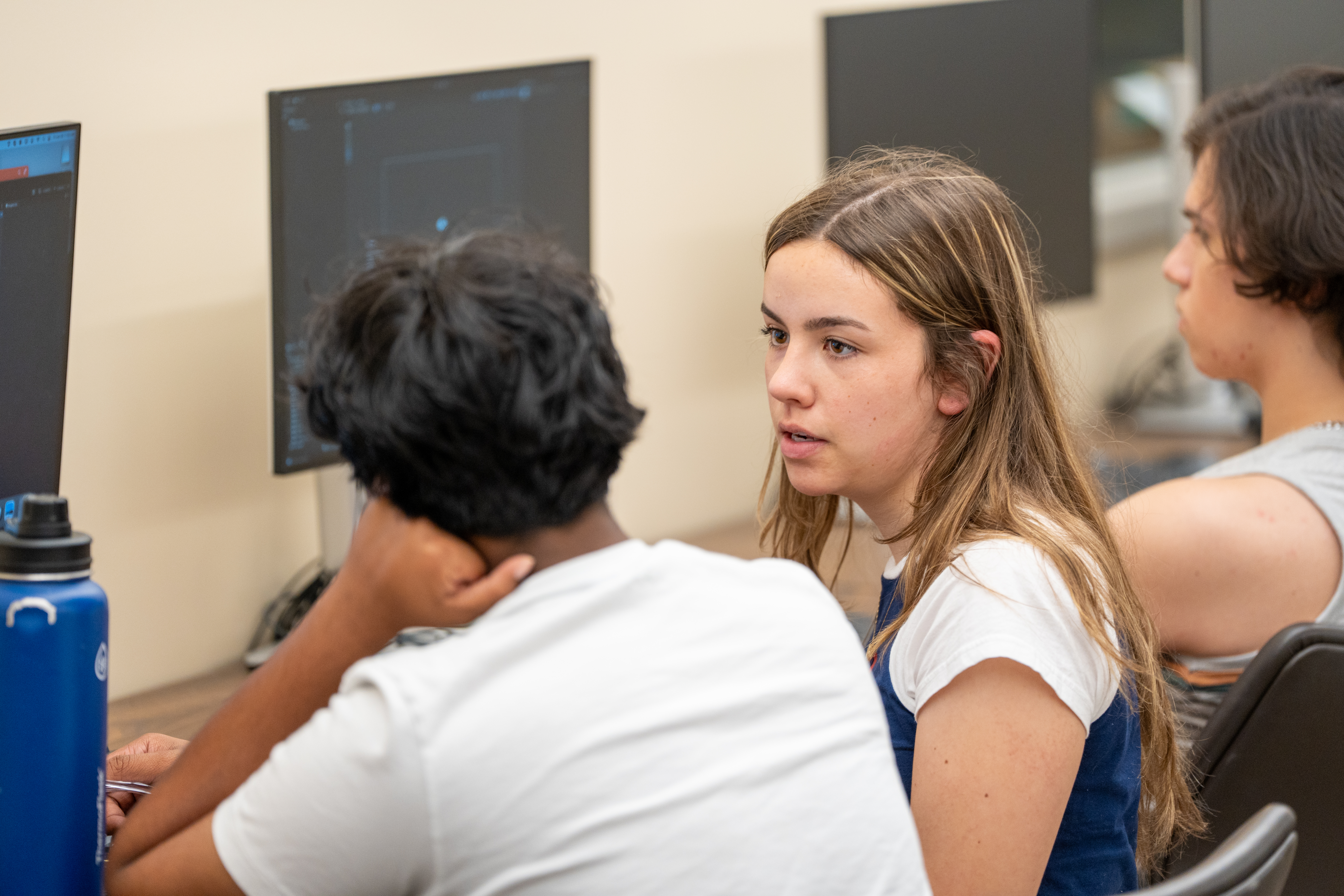 TA teaching student coding