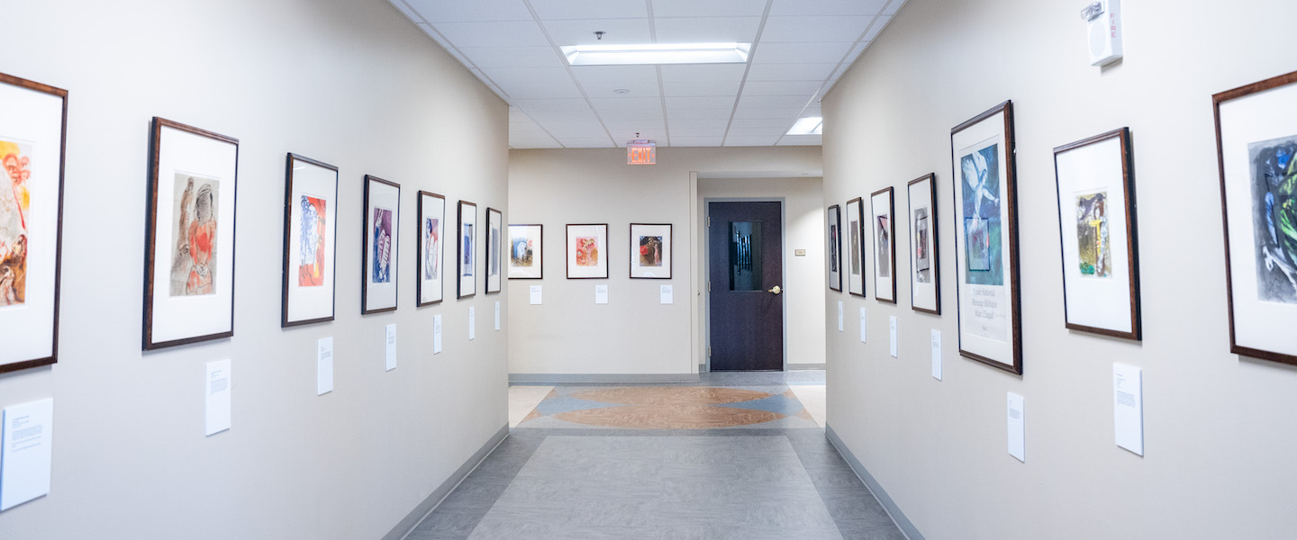 Hallway lined with Chagall art