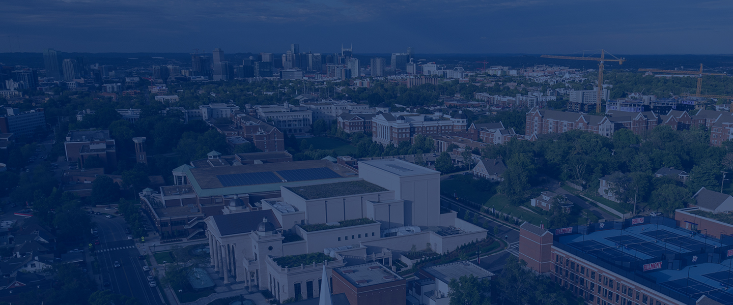 An aerial view of Belmont's campus from the south, with Nashville in the distance