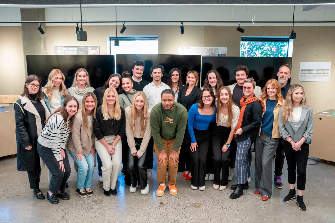 Students involved in the integrated studio stand side by side on the day of their final presentations