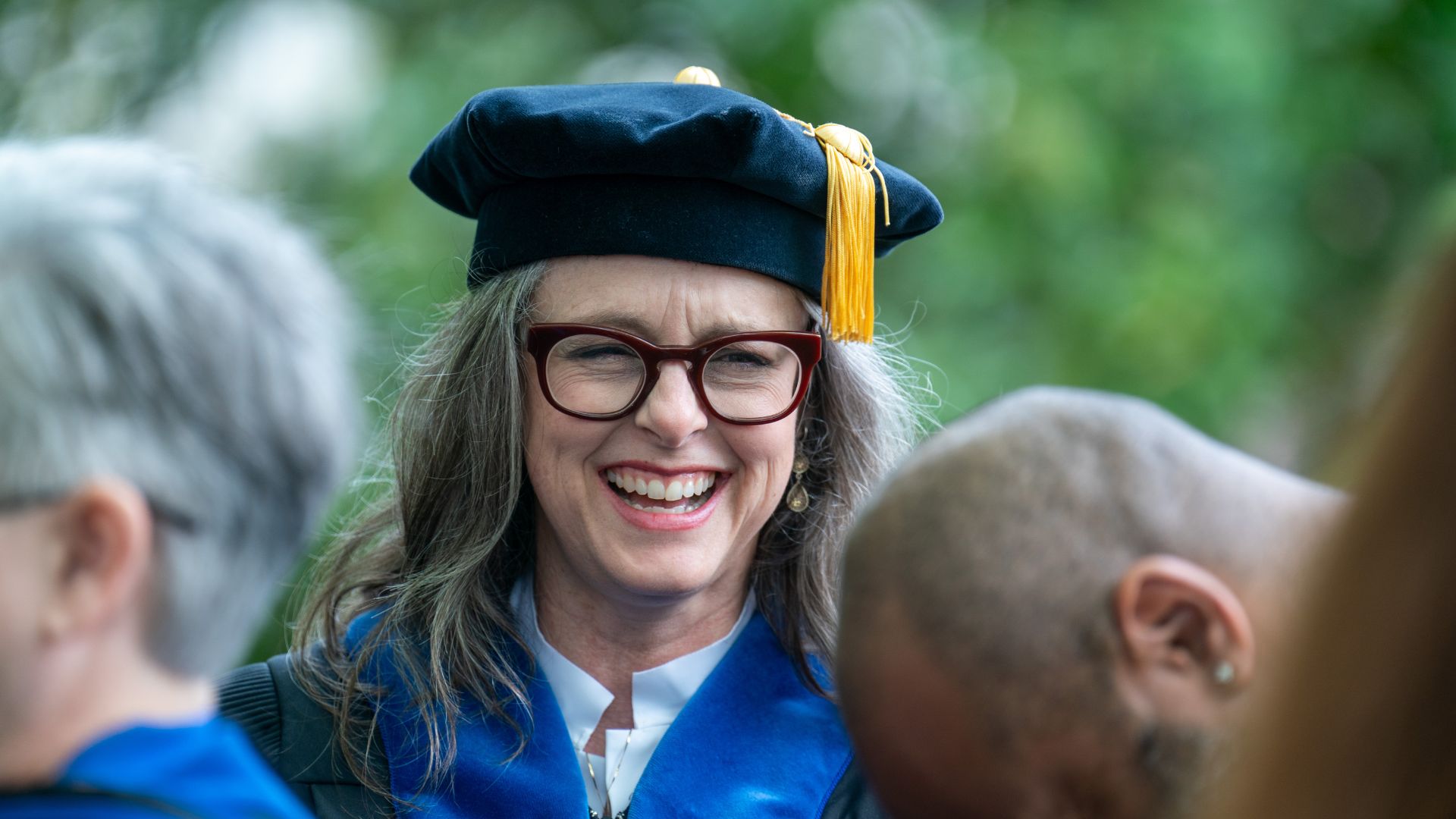 Faculty preps for ceremony