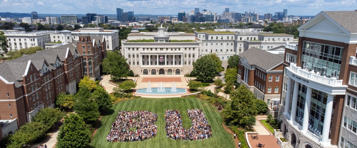 First-year Belmont students spelling out "BU" on the lawn