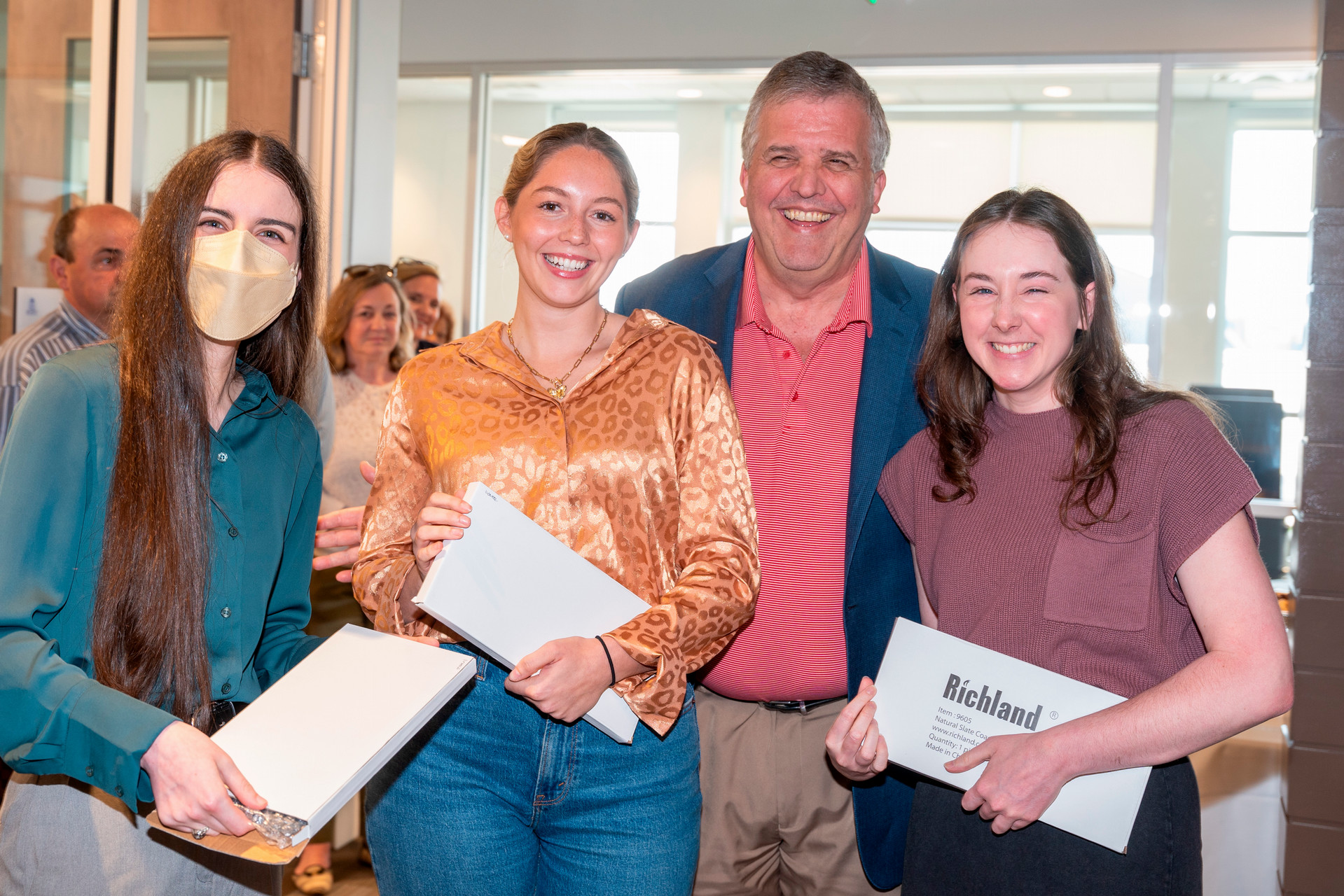 Design team pictured with University President Dr. Greg Jones