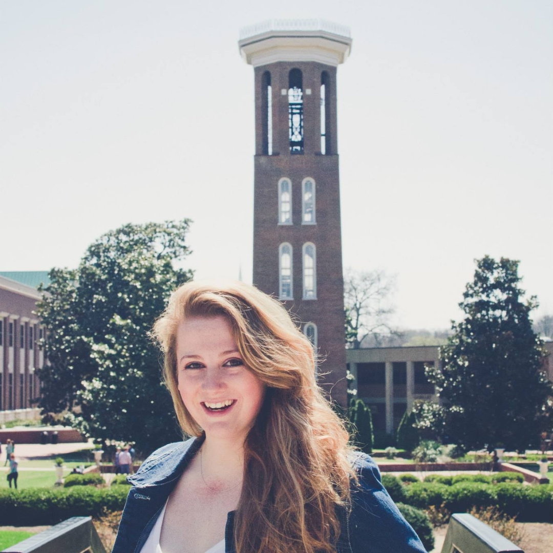 Duncan as a student at Belmont in front of the bell tower