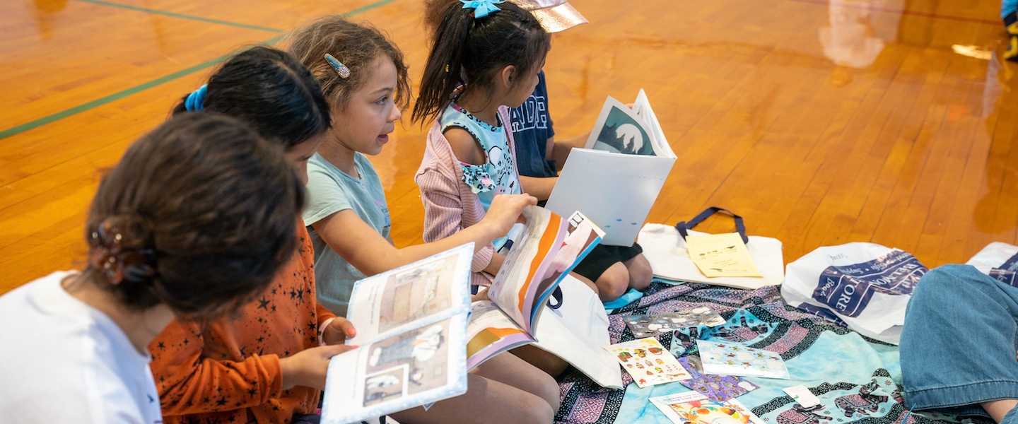 students read at family literacy day 2023