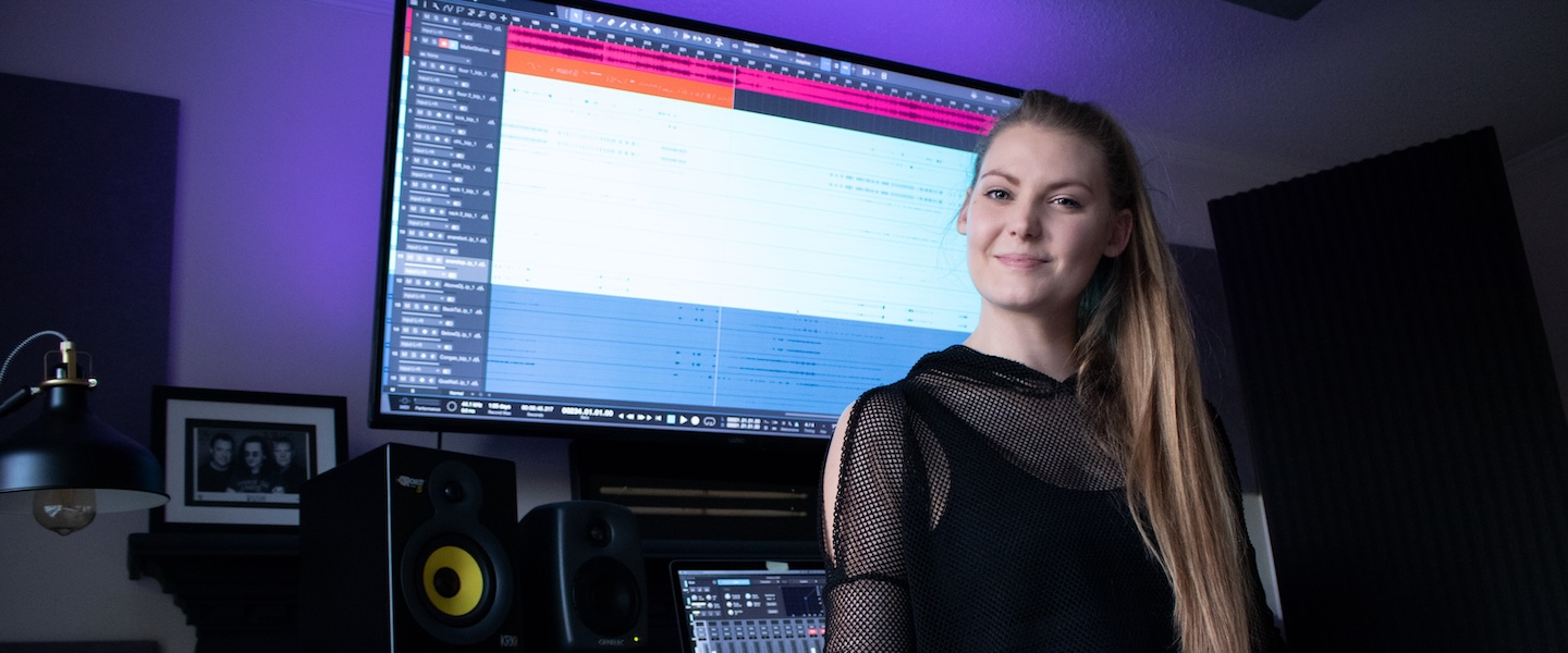 Kayleigh in her home studio