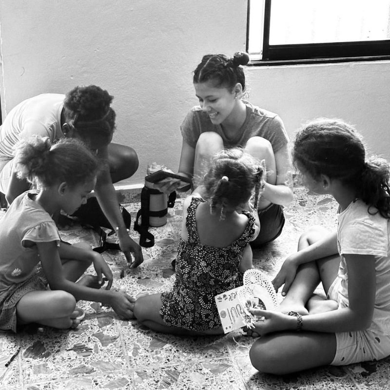 Campbell working with New Hope Girls