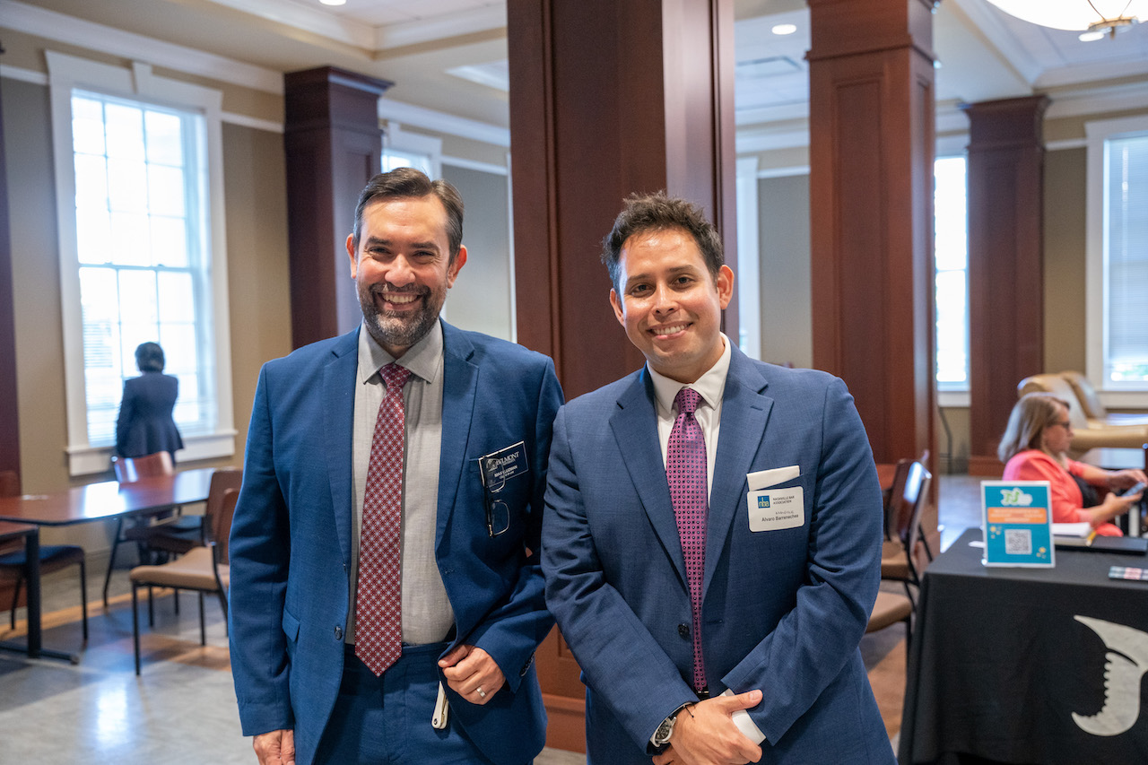 Two male summit attendees