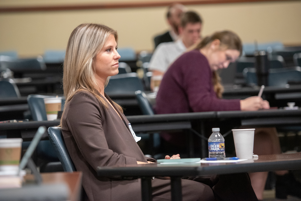 Woman attending symposium