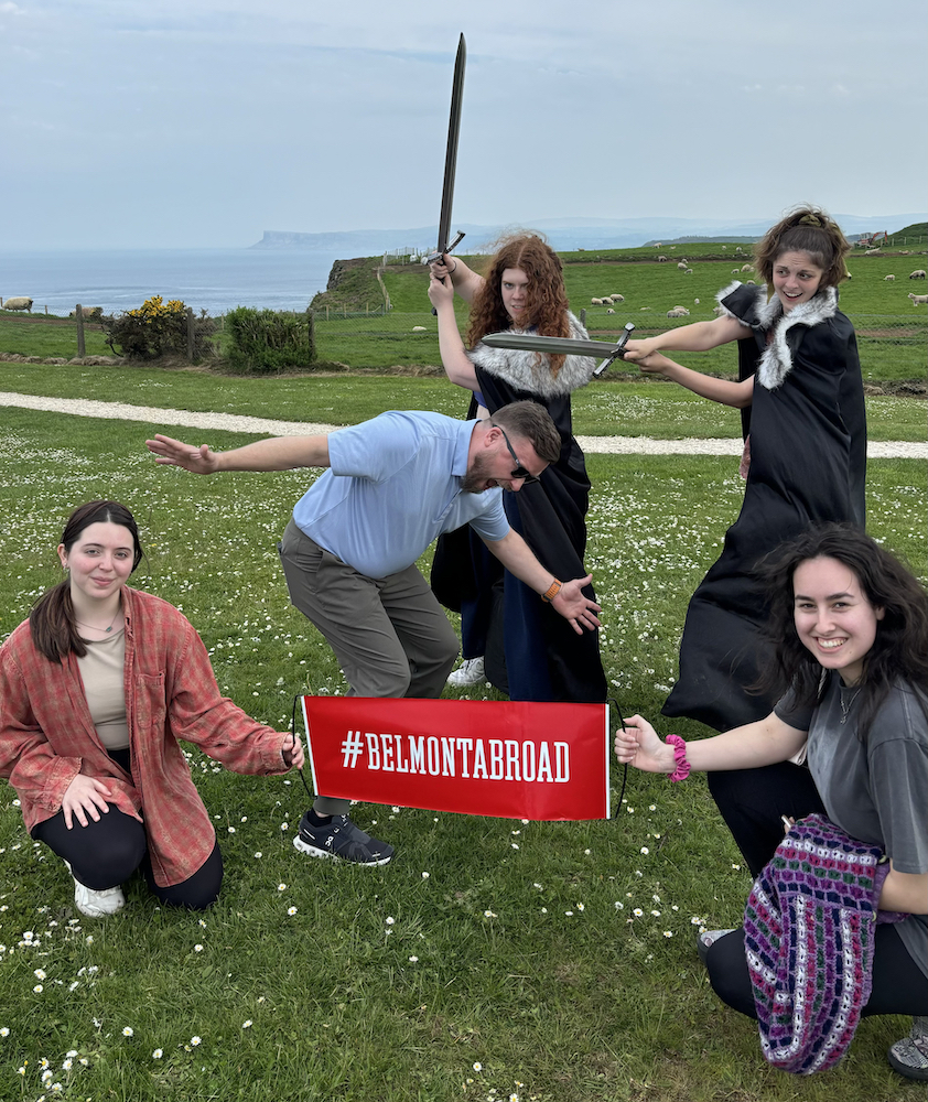 trip attendees in ireland with Belmont abroad sign