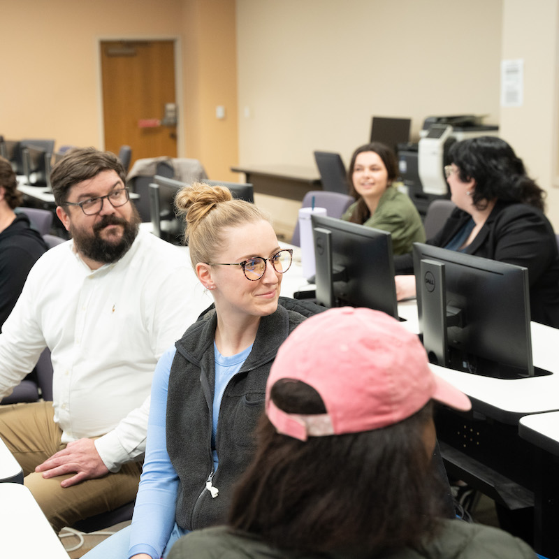 Graduate students in computer lab