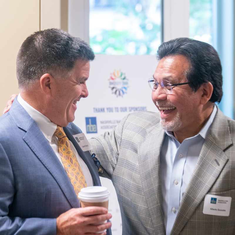 Belmont Provost David Gregory (left) and Belmont Law Dean Alberto Gonzales