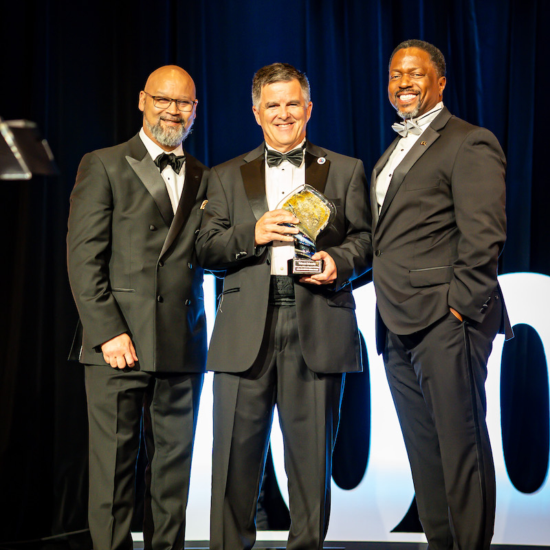 David Gregory accepting award from The 100