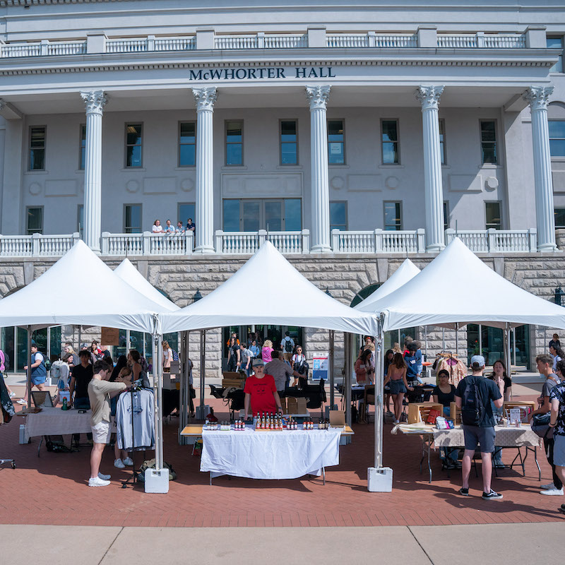 Vendor tents and shoppers at Entrepreneurship Village