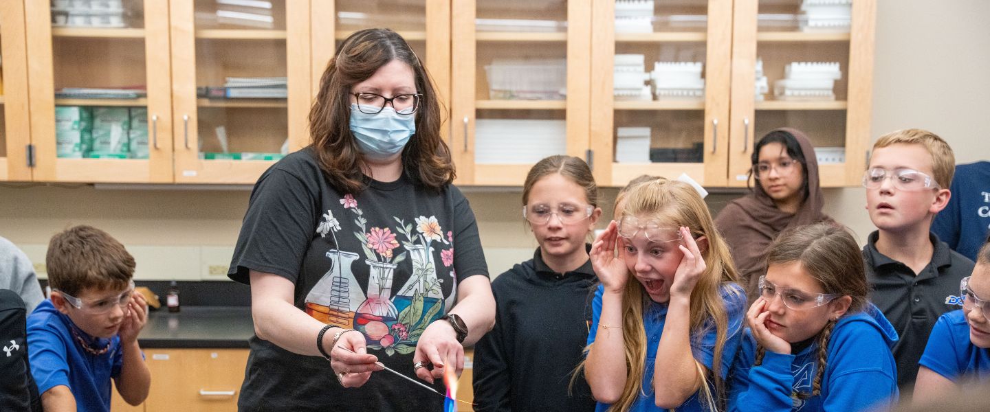 Dr. Danielle Garrett and elementary students