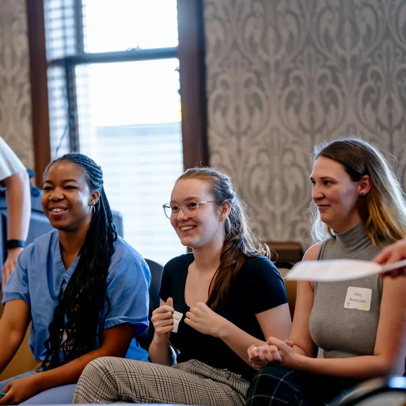 Alumni sit together on a panel