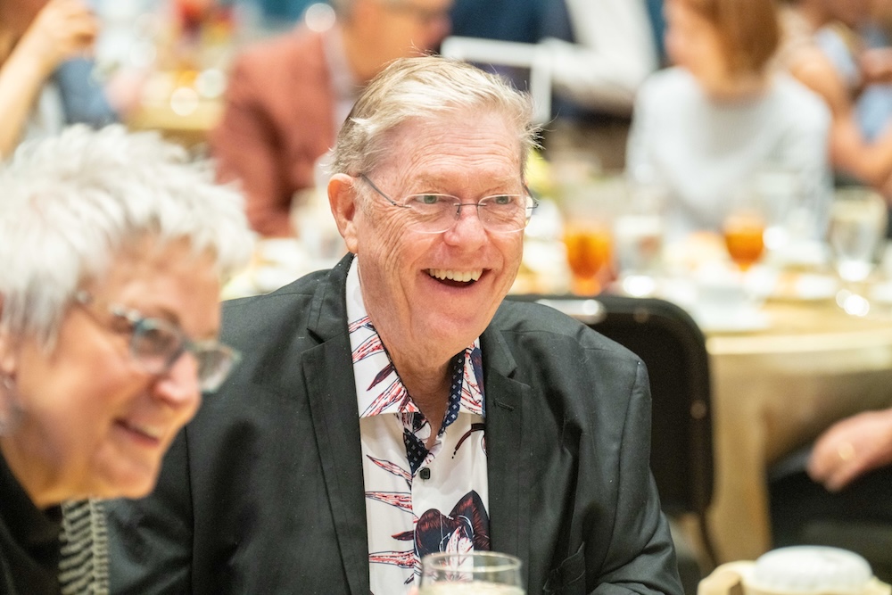 FAB member smiling at an event