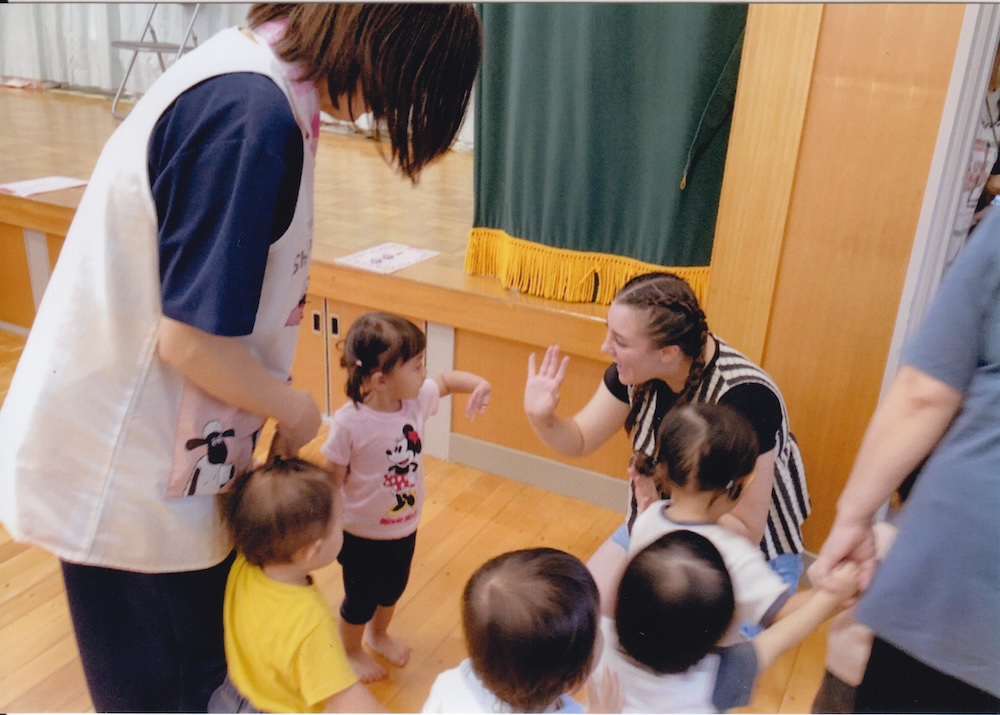 Lockney engaging with students in Japan