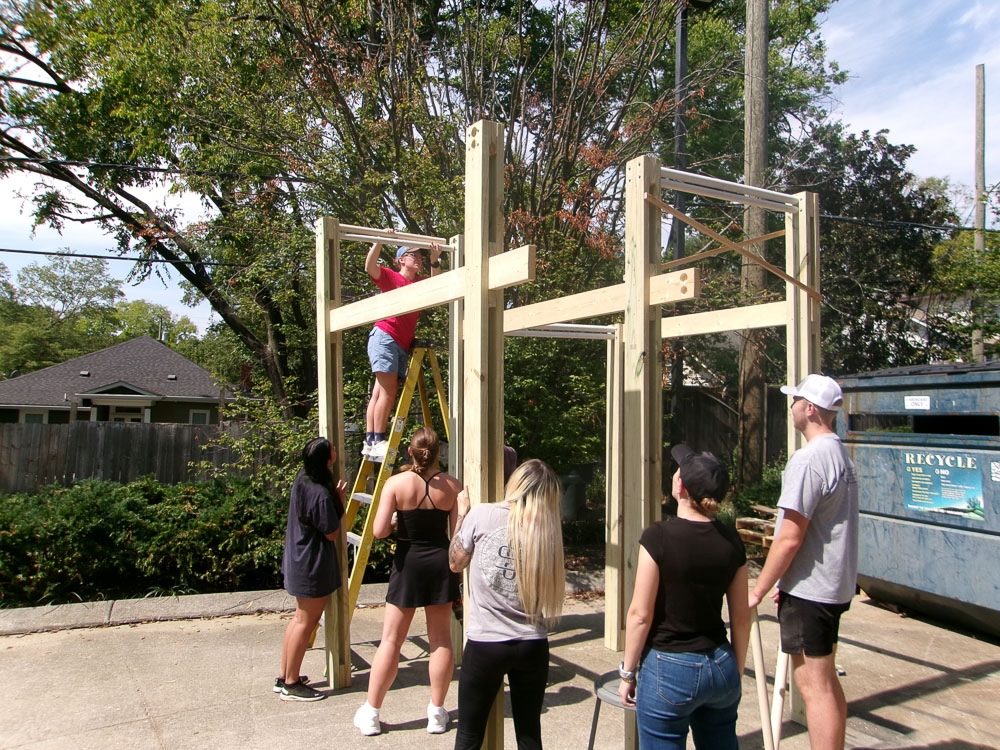 students smile from construction day