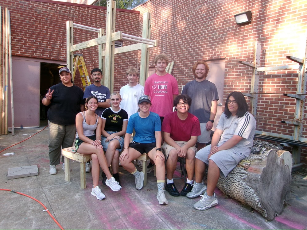 students smile from construction day