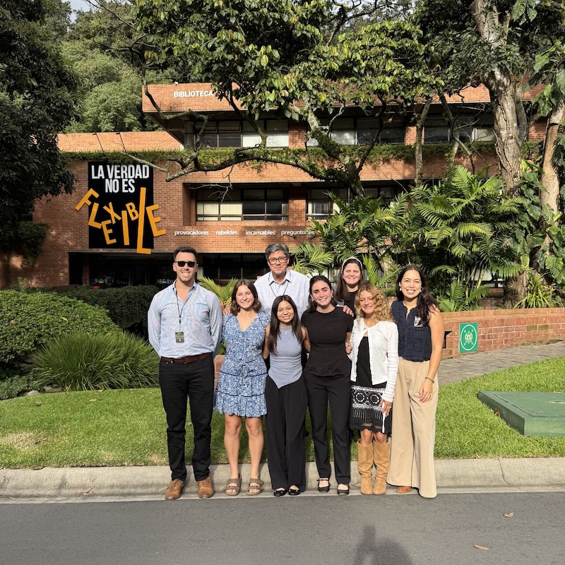 Students and faculty pose together outside of Universidad Francisco Marroquín in Guatemala.