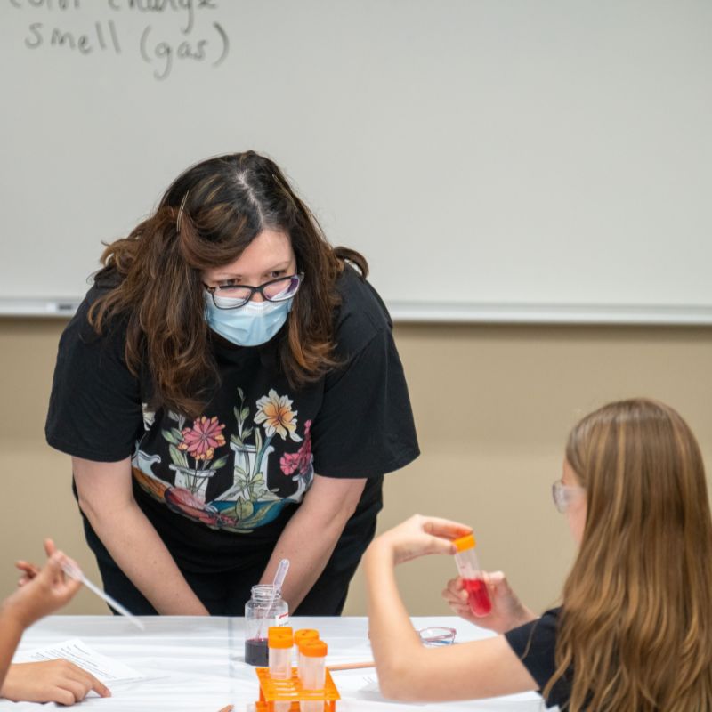Dr. Danielle Garrett talking to a student