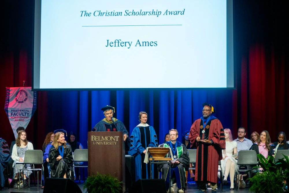 Dr. Ames accepting his award