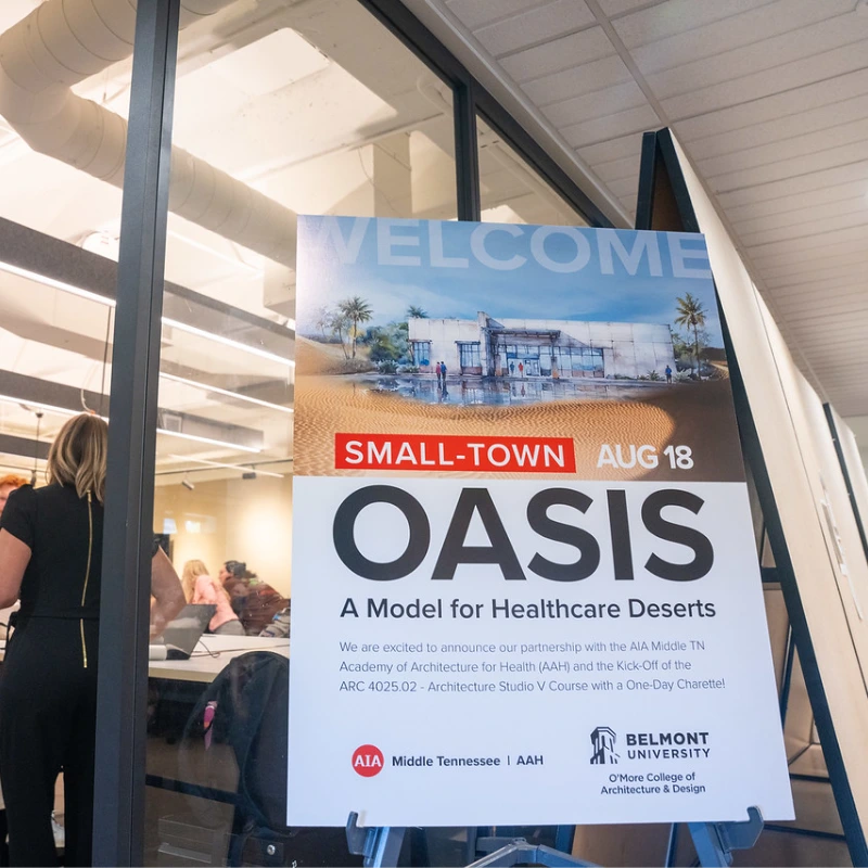 Presentation banner for 'Small-Town Oasis: A Model for Healthcare Deserts' project, with a group meeting.