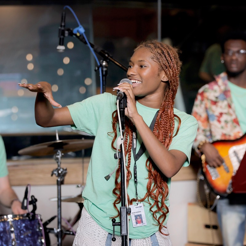 Student performing at Grammy camp. Photo by Tibrina Hobson/Getty Images for The Recording Academy