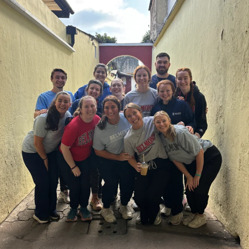 Students on a mission trip, smiling in a group