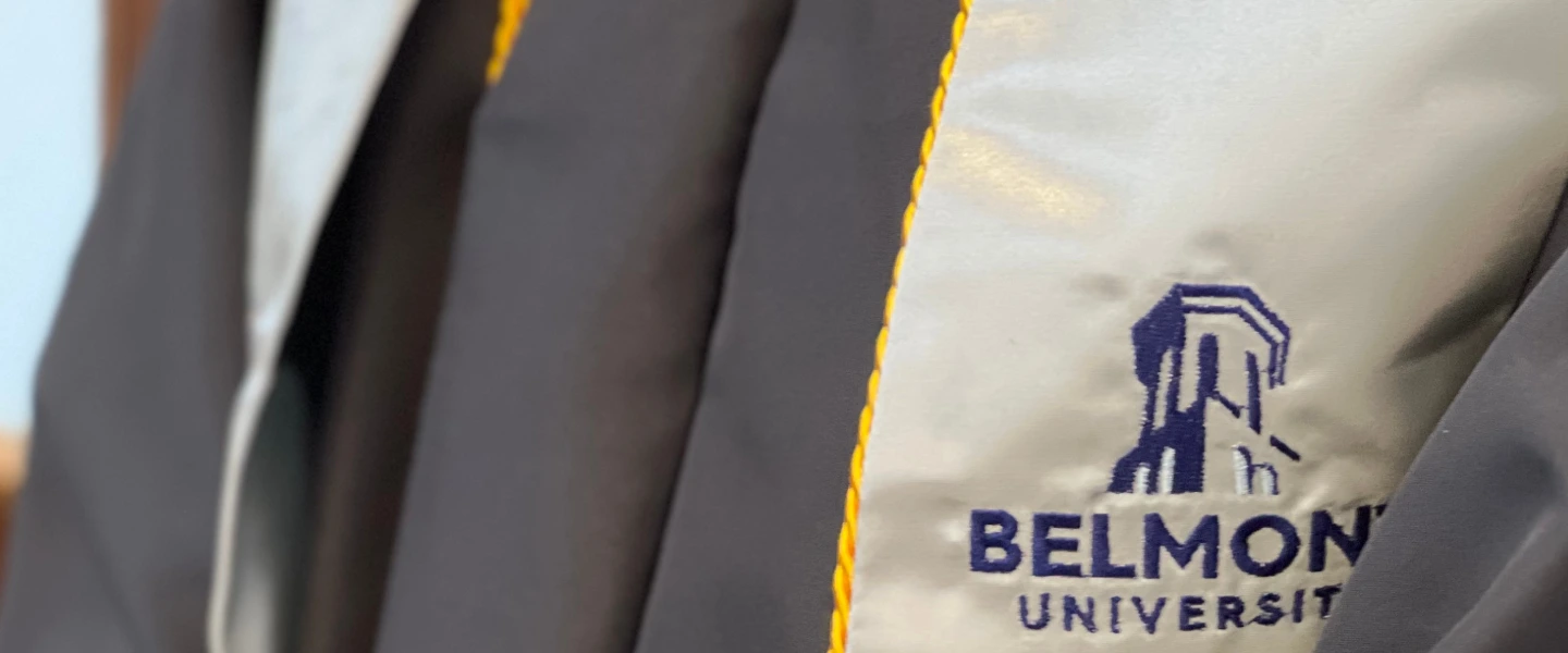 close up of a graduation robe with Belmont logo